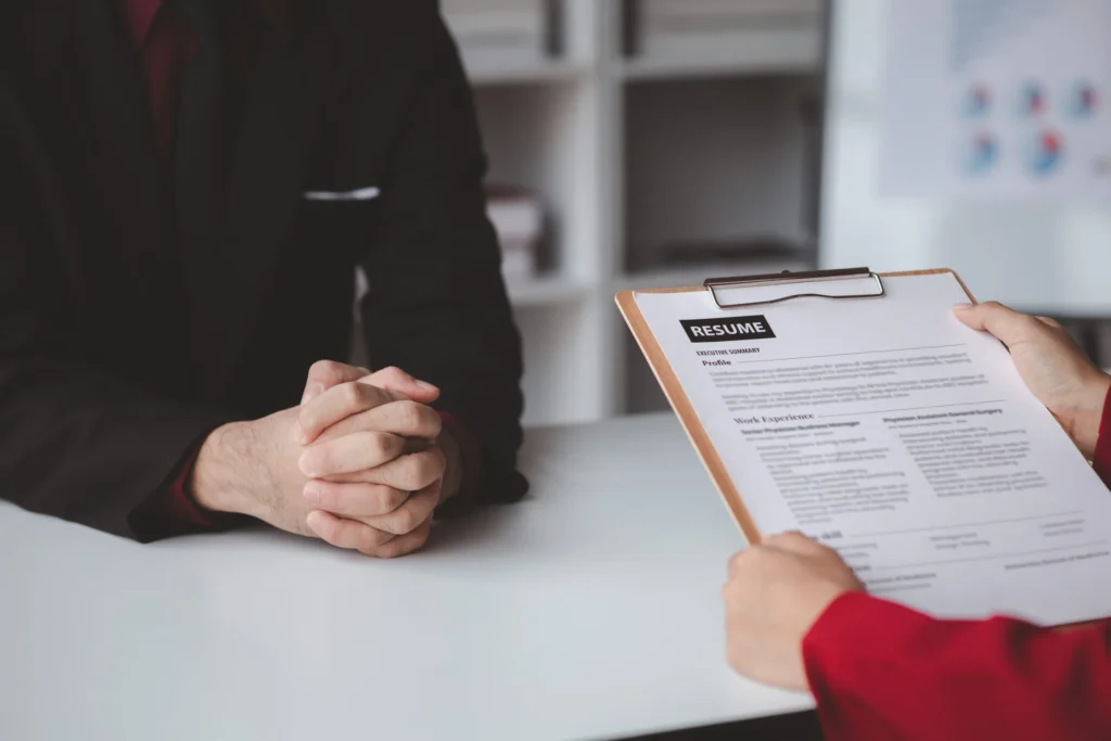 Person attending a job interview with a manager to be recruited to the company for the position applied for.